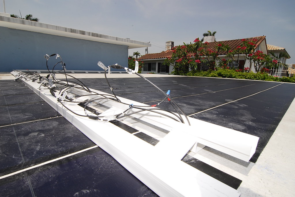 Professional roof installation on residential home